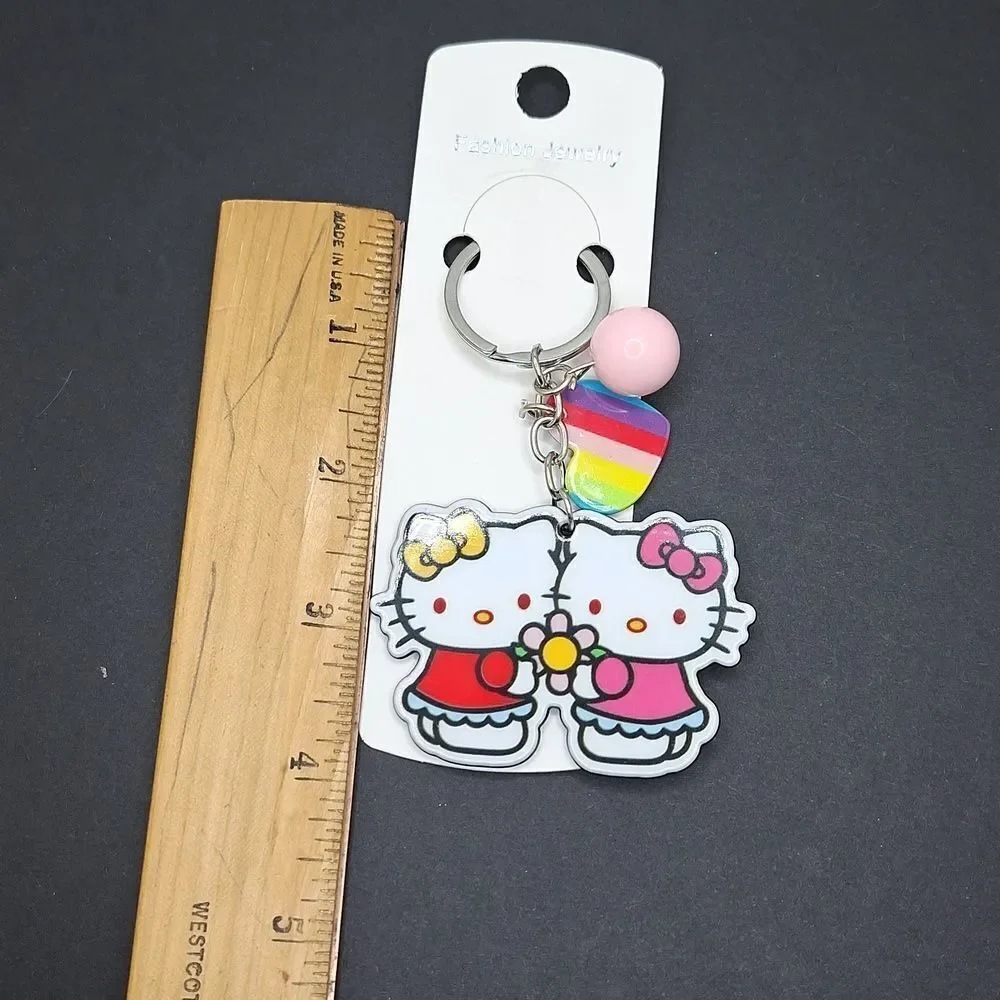 Hello kitty keychain pink bow rainbow heart bead and charm